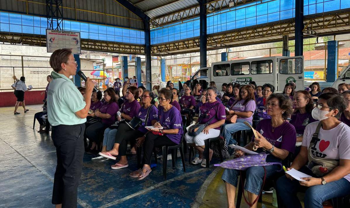 A community orientation session at a barangay hall