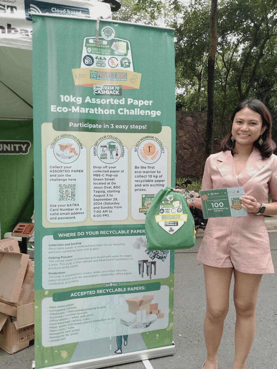 An Eco-Warrior with the Eco-Marathon Challenge banner and rewards kit