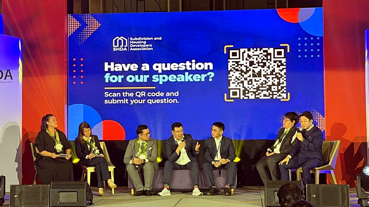 The speakers' panel taking questions after the session